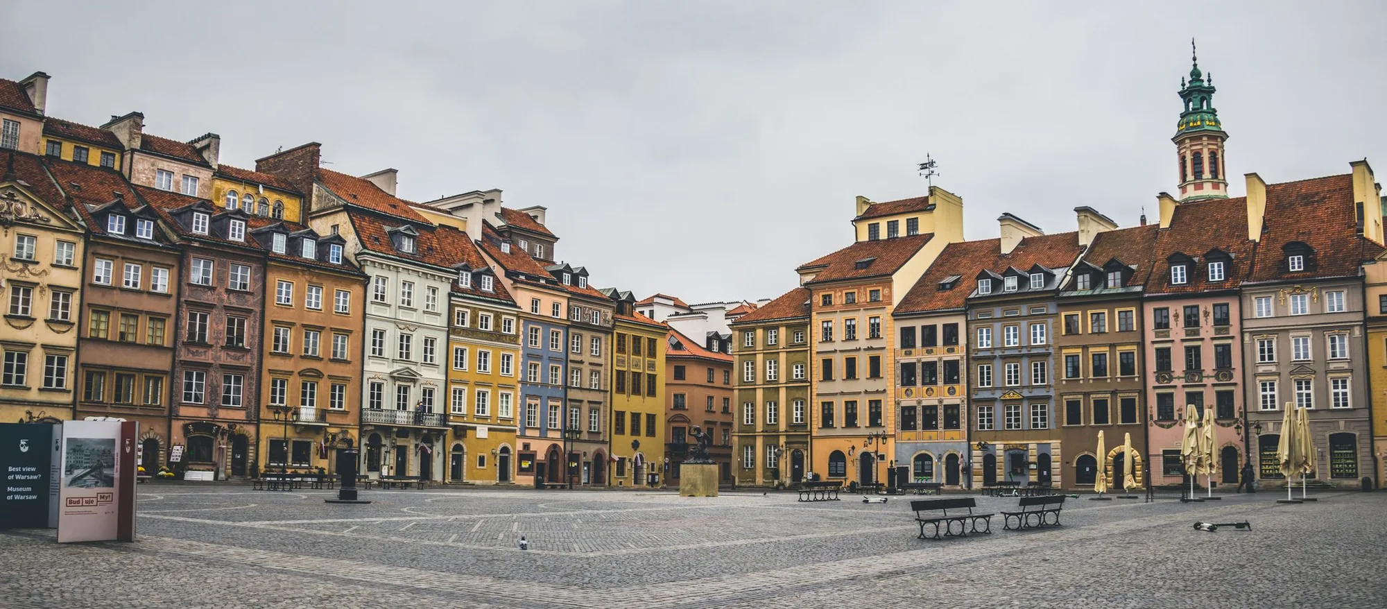 The gabled, colourful houses on one side of Warsaw's Old Town Market Square